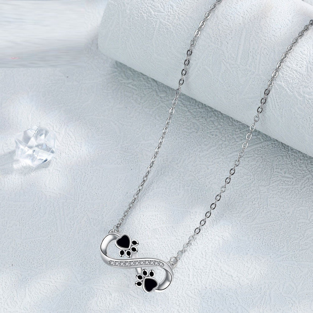 Halsband med tass och zirkonia – oändlig kärlek