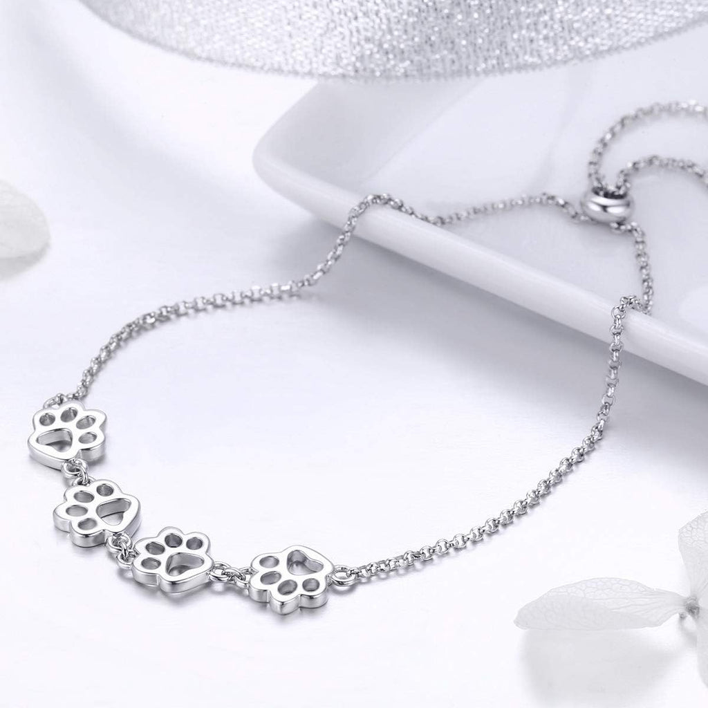 Justerbart armband i sterlingsilver med hundtassar