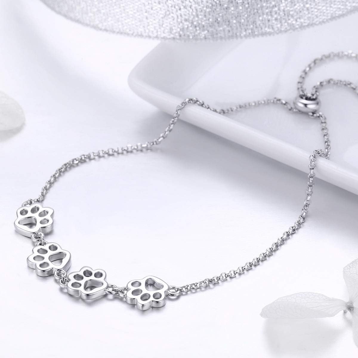Justerbart armband i sterlingsilver med hundtassar