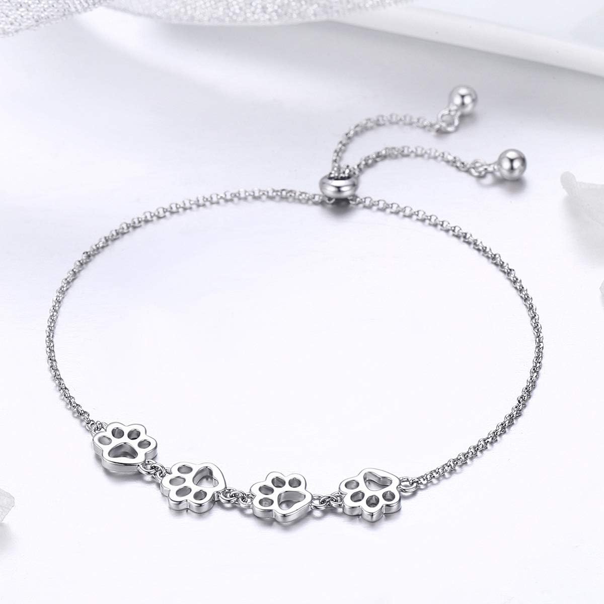 Justerbart armband i sterlingsilver med hundtassar
