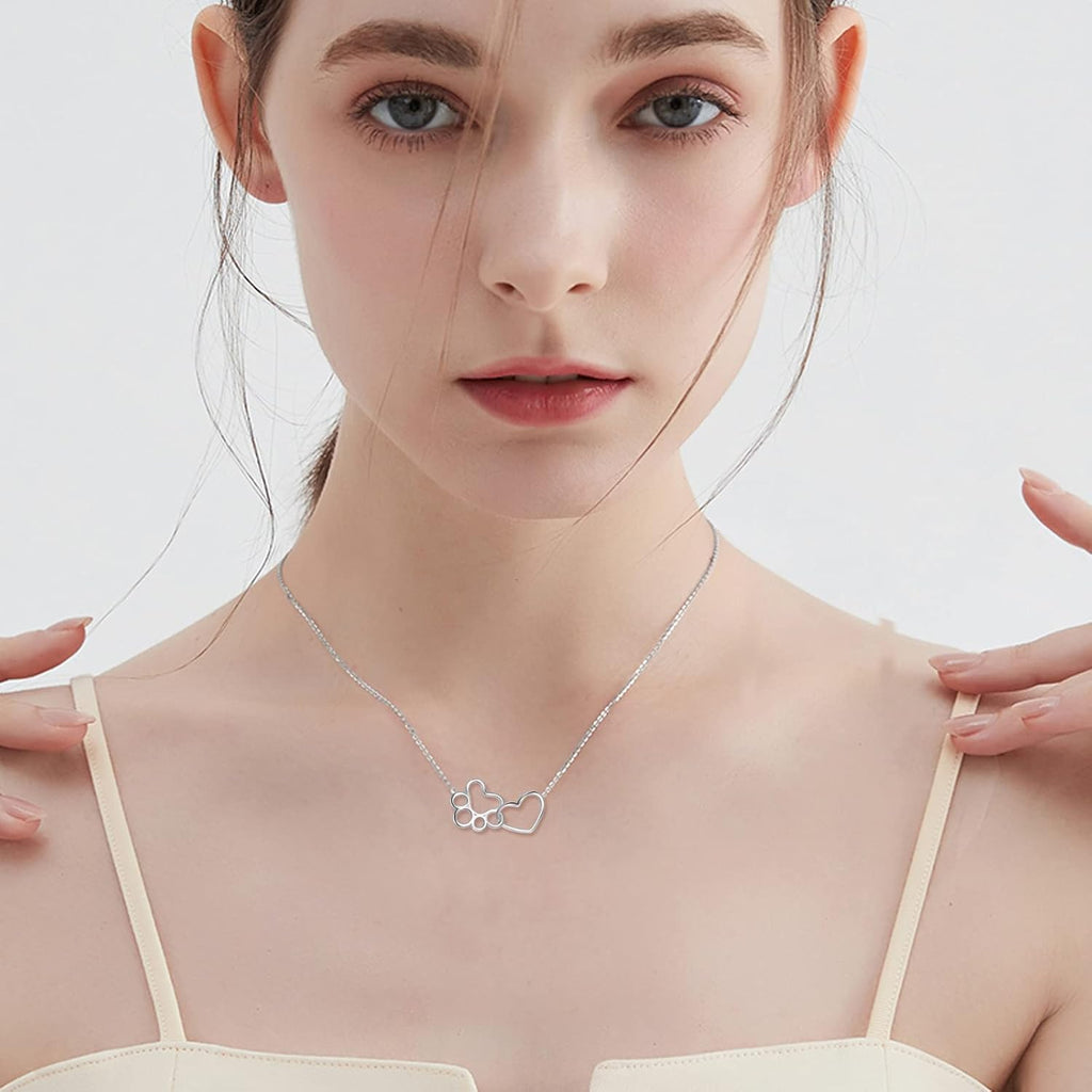 Halsband i sterlingsilver med tass och kristallhjärta