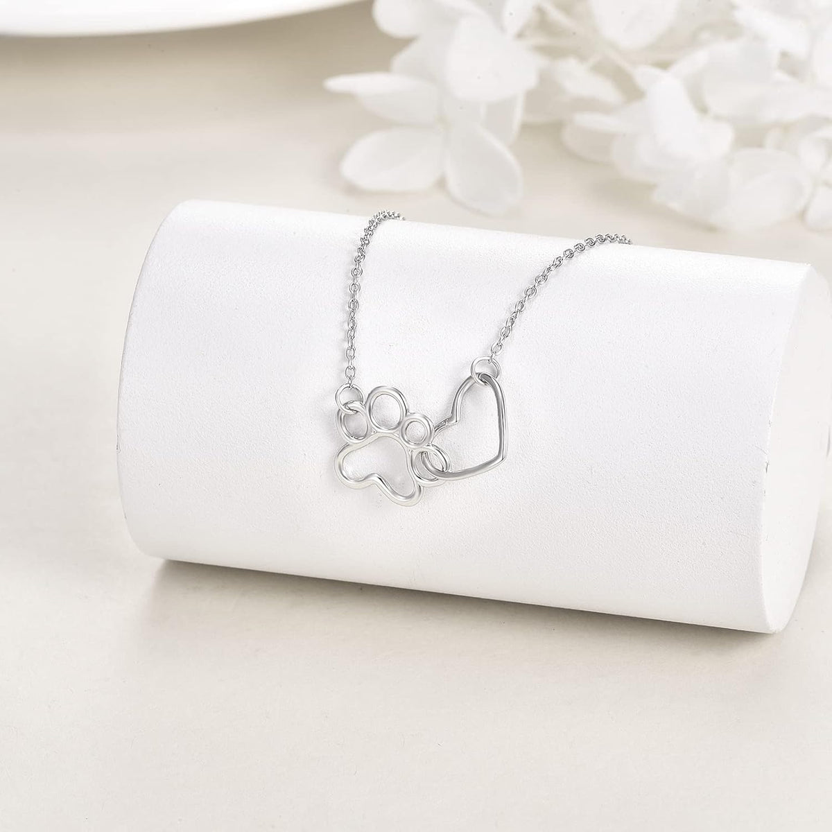 Halsband i sterlingsilver med tass och kristallhjärta
