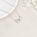 Halsband i sterlingsilver med tass och kristallhjärta