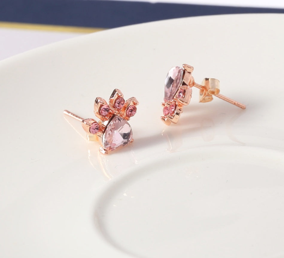 Smyckesset i fyra delar med tass och hjärta i roséguldton