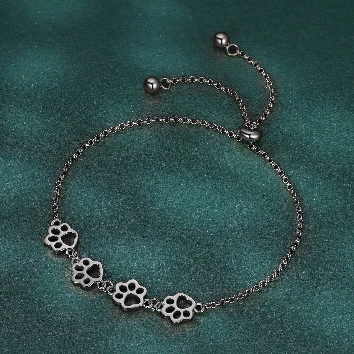 Justerbart armband i sterlingsilver med hundtassar