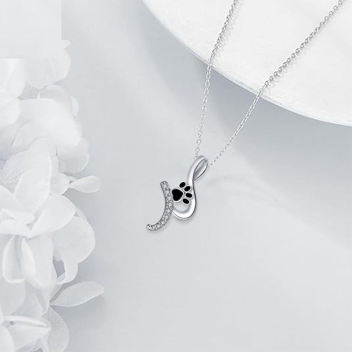 Halsband med tassberlock – trogen vän