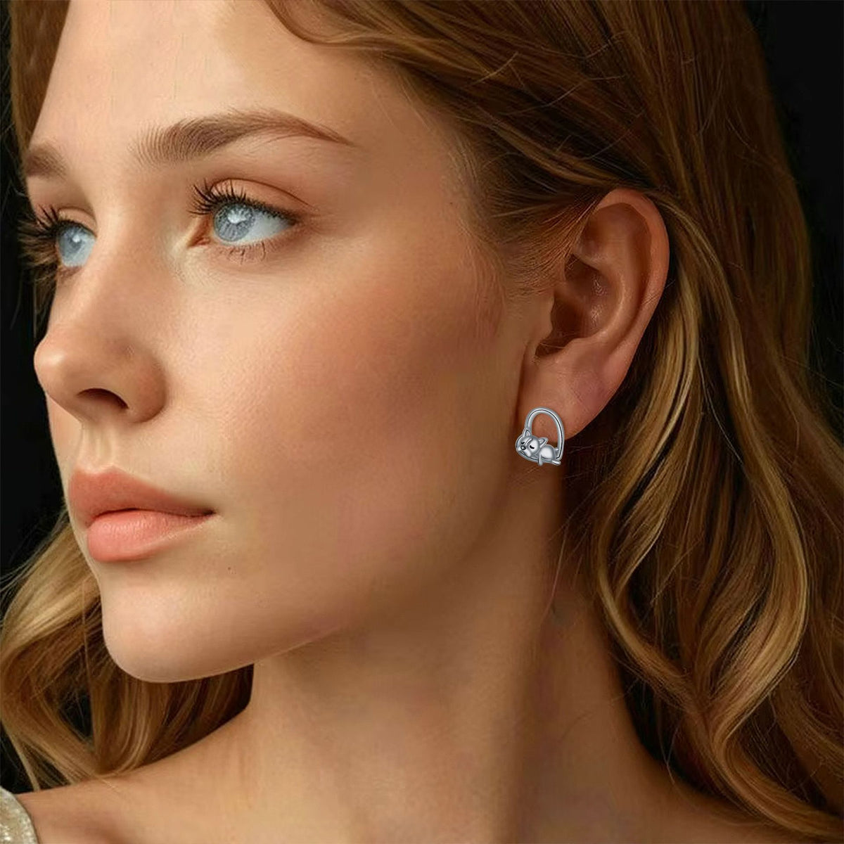 Hängande örhängen med sovande valp i sterlingsilver