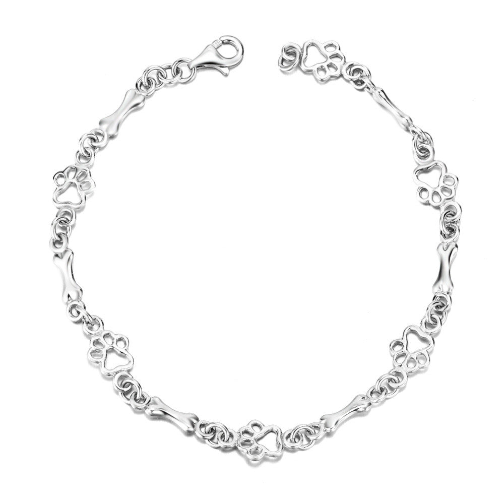 Silverarmband med tass- och benberlocker
