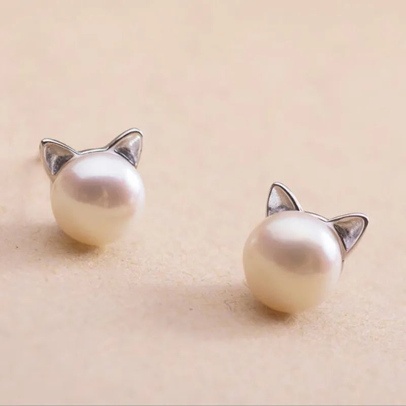 Kattörhängen i sterlingsilver med pärlor