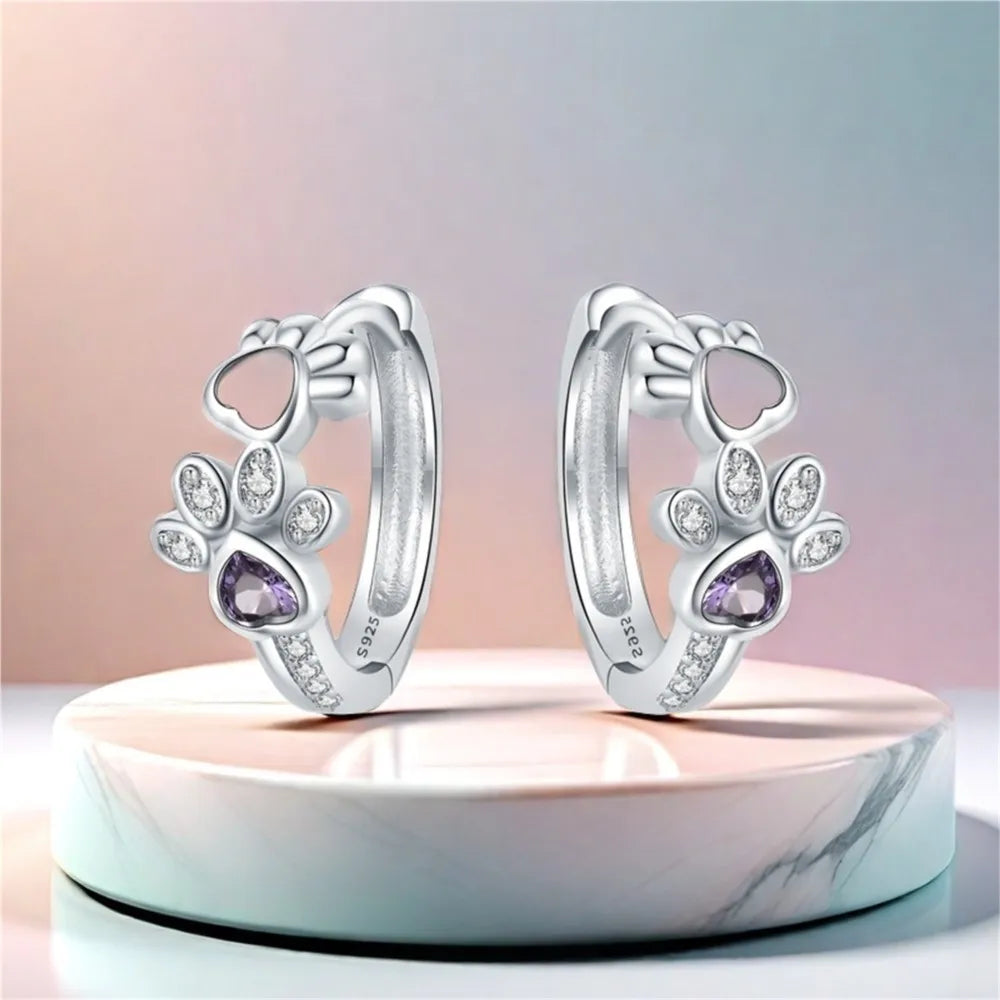 Ringörhängen i sterlingsilver med tass och zirkoniahjärta