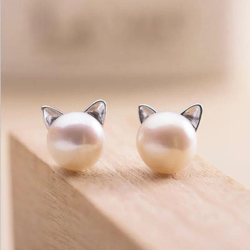 Kattörhängen i sterlingsilver med pärlor