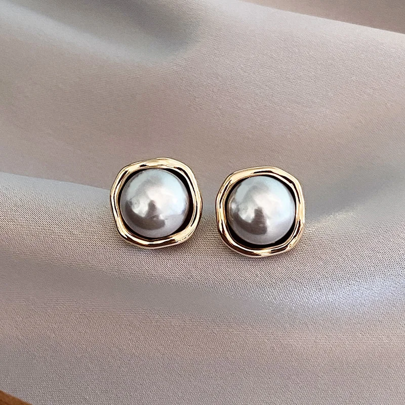 Eleganta vintageinspirerade pärlörhängen